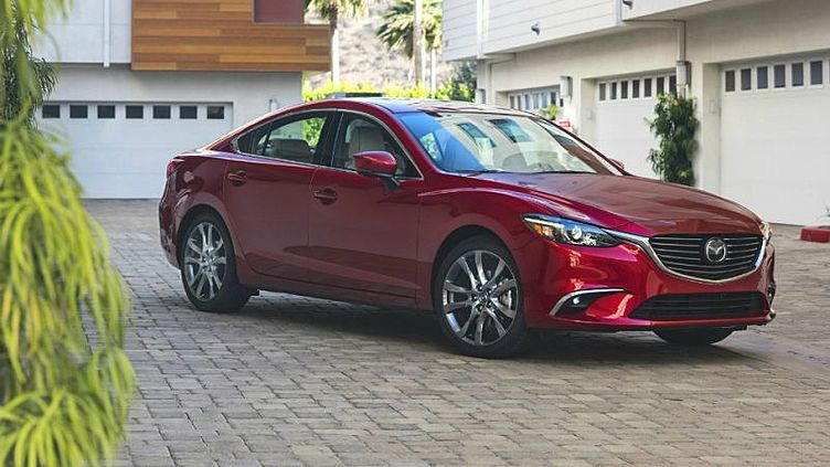 Mazda обновила «тройку» и «шестерку» Mazda обновила «тройку» и «шестерку»