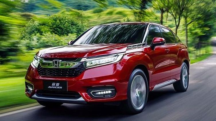 Honda поделилась изображениями своего нового кросс-купе Honda поделилась изображениями своего нового кросс-купе