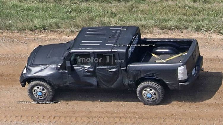 Шпионы сфотографировали пикап Jeep Wrangler Шпионы сфотографировали пикап Jeep Wrangler